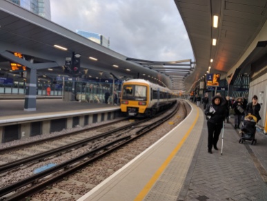 This is a train pulling in at Deptford Station on its way to London Bridge Station.