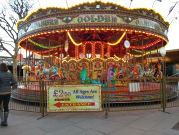 A beautiful golden carousel down on the Thames.