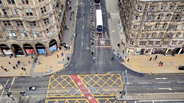 Here is a view of Edinburgh roads and architecture from the top of a massive monument.