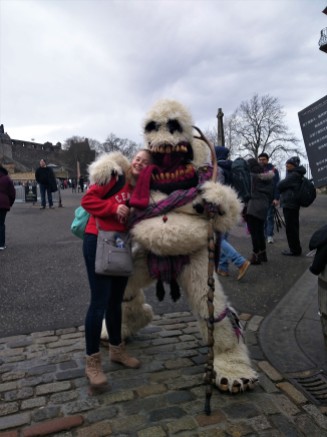 Here I am with a giant yeti mascot named Haggis outside of Edinburgh Castle.